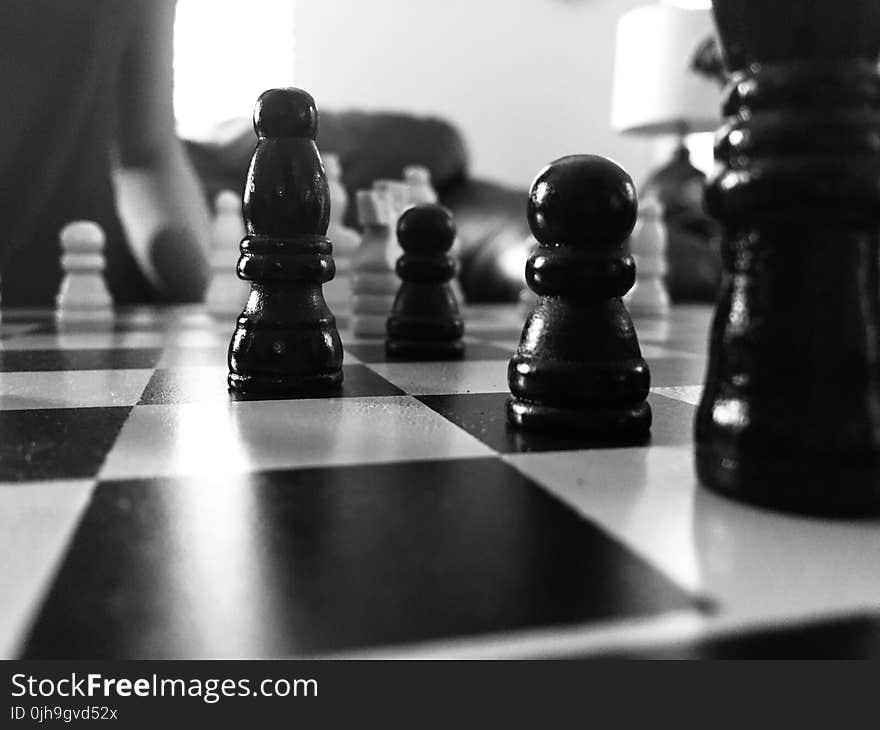 Grayscale Photography Of Chess Board