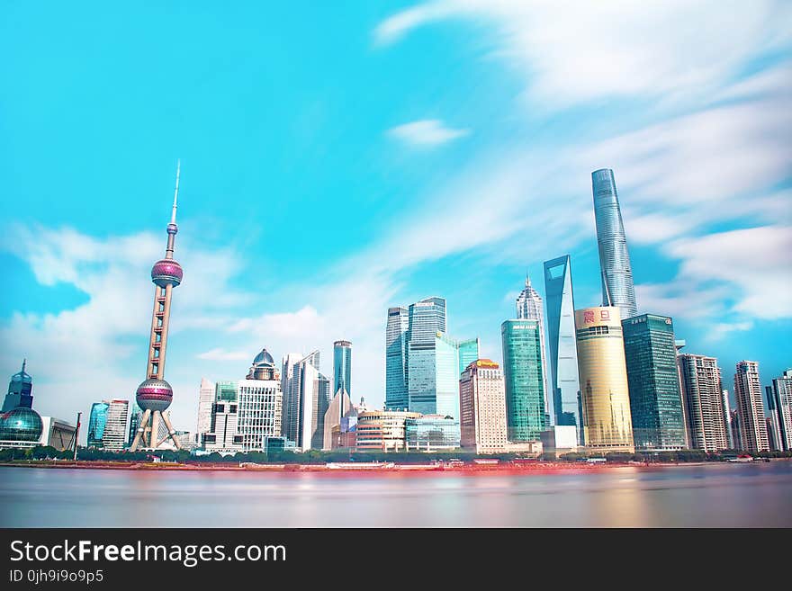 High Rise Buildings Under Blue Sky