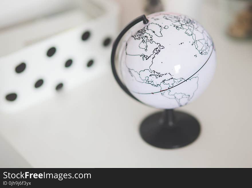 White globe on a desk