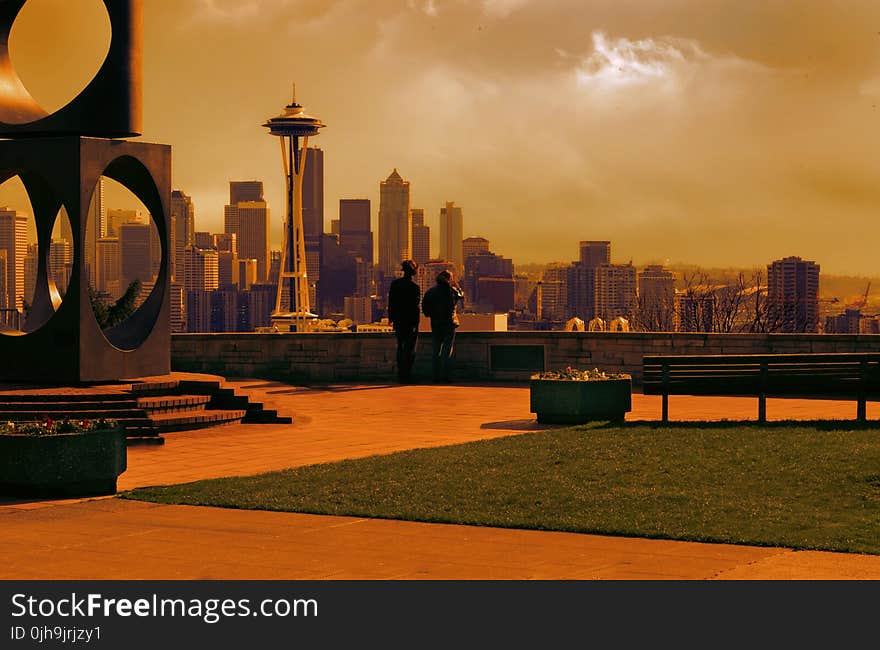 Man and Woman Looking at Space Needle Photo