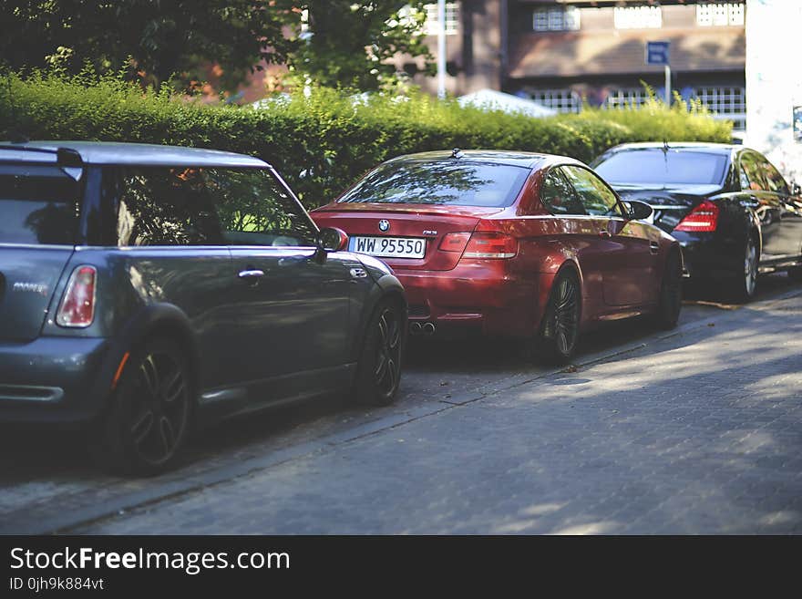 Cars parked along way