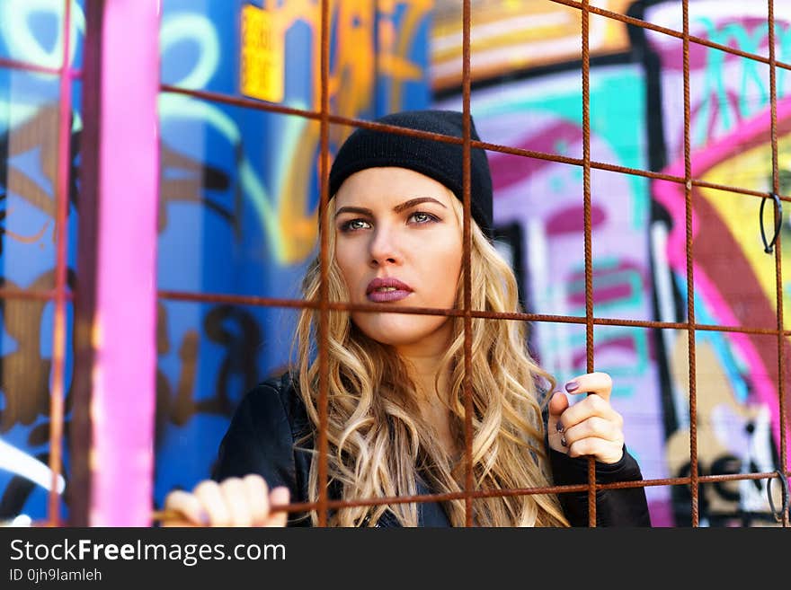 Woman Wearing Black Knit Cap With Black Jacket