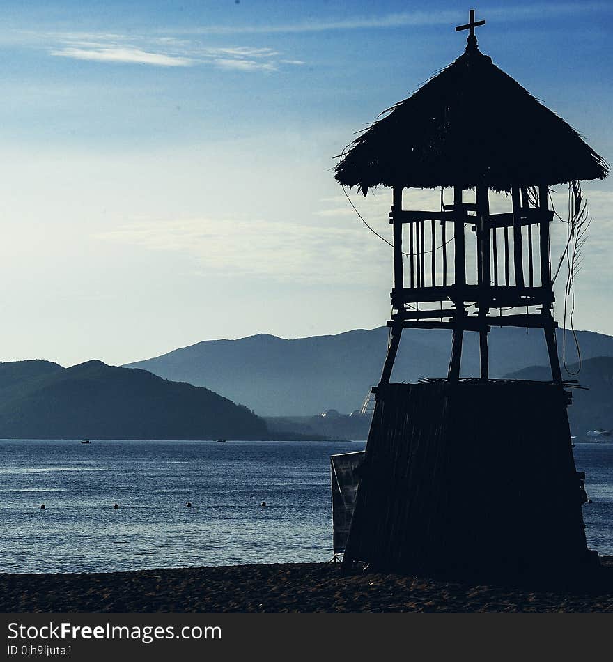 Silhouette Photo of Wooden Guard House