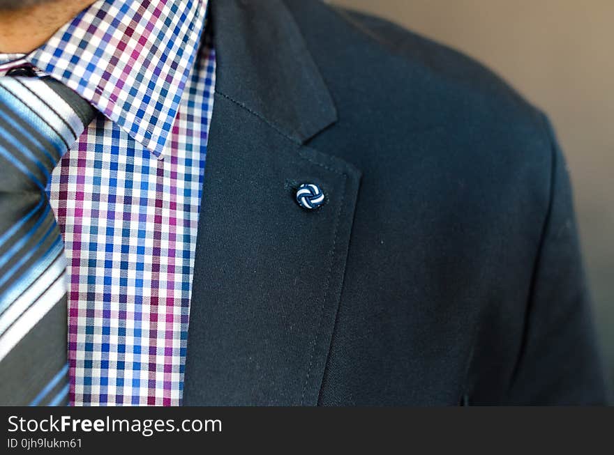 Closeup Photo of Man in Black Suit Jacket