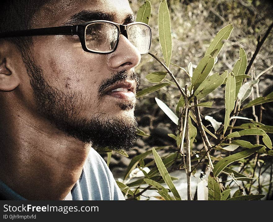 Man Wearing Black Framed Eyeglasses