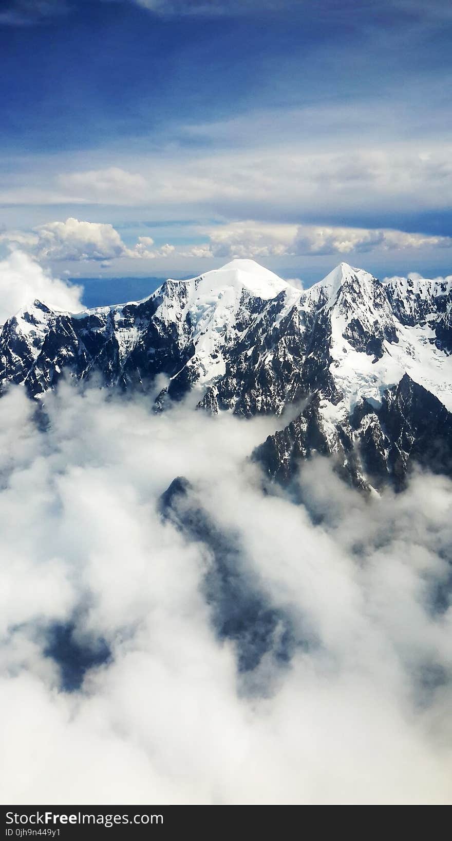 Aerial View of Mountain With Snow