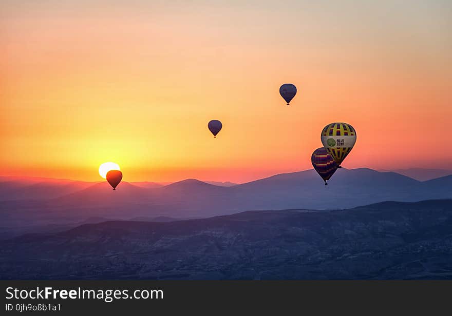 Assorted Hot Air Balloons Photo during Sunset