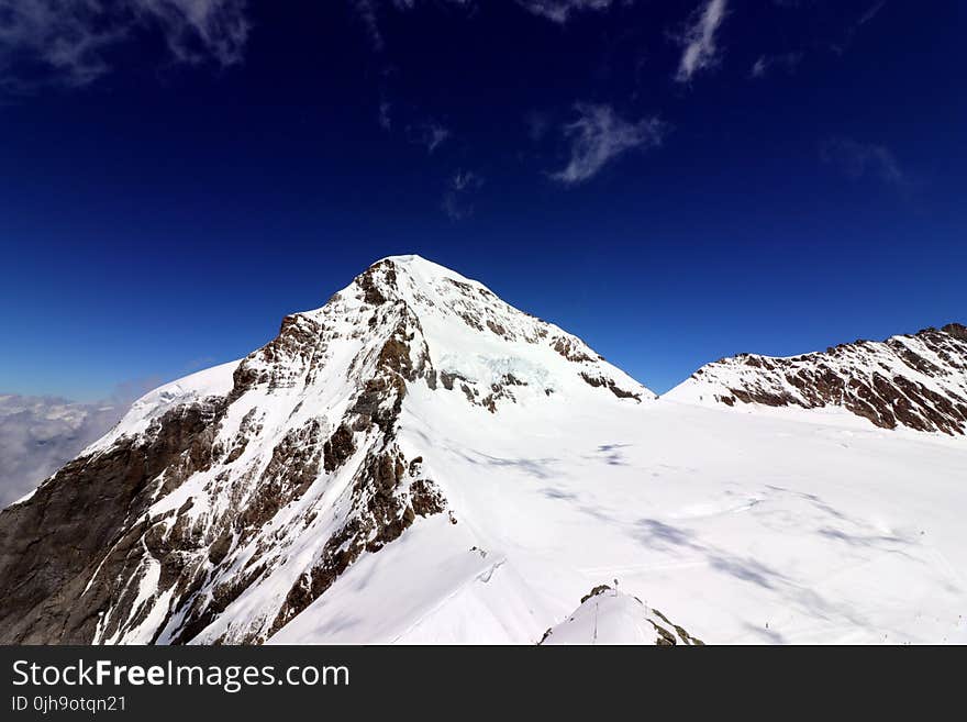 Photo of Mountain Surrounded by Snow