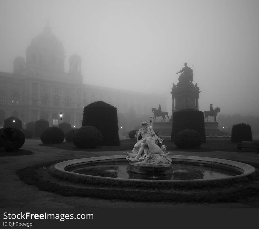 Two People Statue over Fog