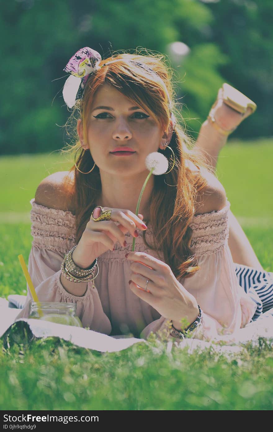 Portrait of Woman Lying on Grass at Daylight Photography