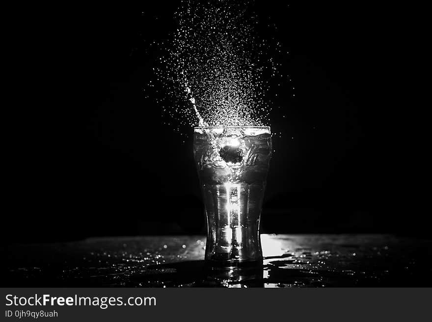 Grayscale Photo of Drinking Glass