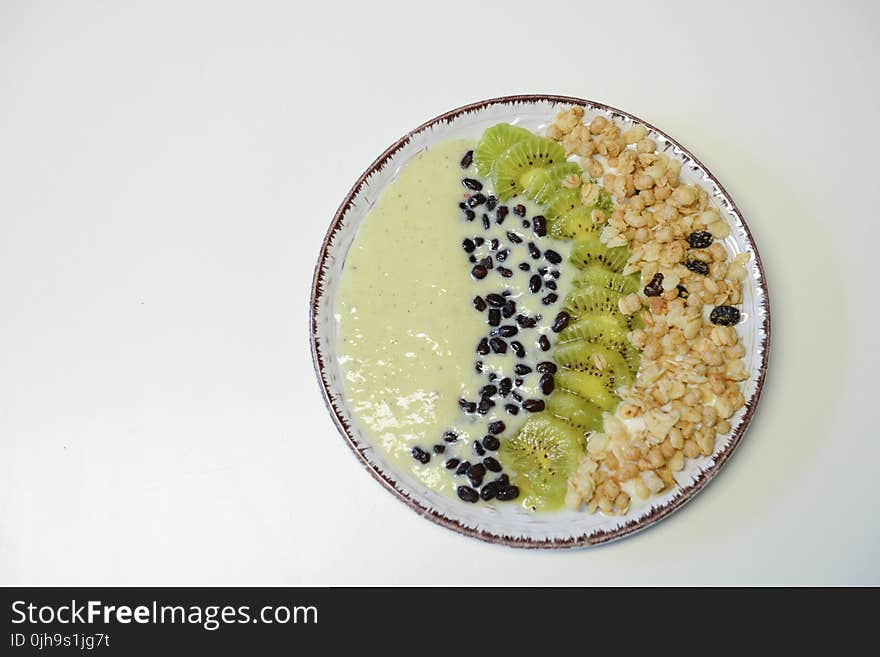 Slice Kiwifruit and Nuts on Plate