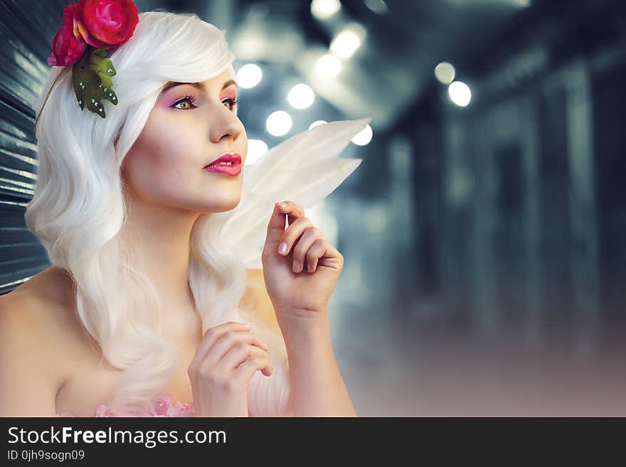 Tilt Lens Photography of Woman With Flower Headband