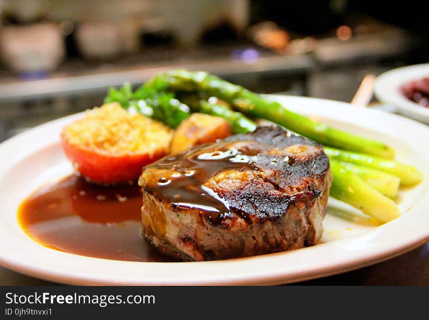 Selective Focus Photography of Beef Steak With Sauce