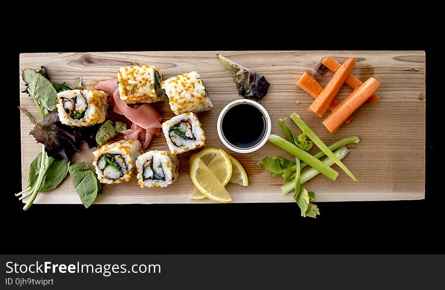 Cooked Food on Brown Wooden Board