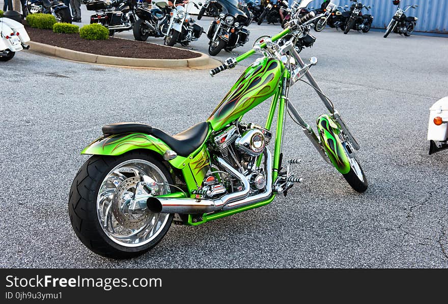 Green Naked Chopper Motorcycle on Parking Lot