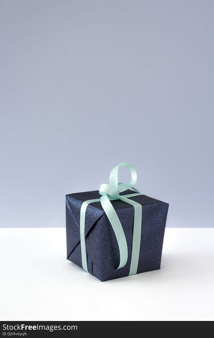 Blue Gift Box With Blue Ribbon