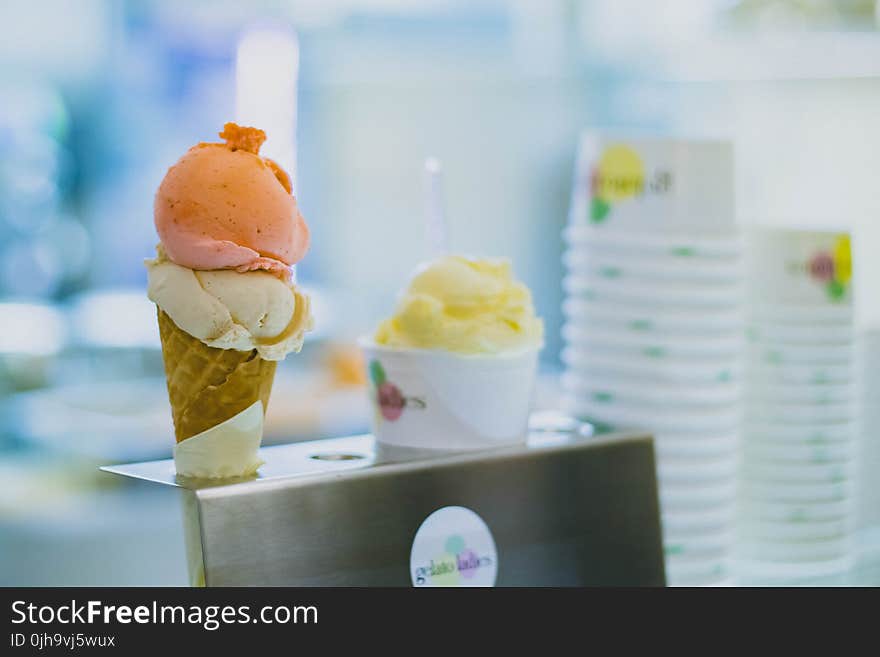 Ice Cream on Cone With Gray Metallic Holder Photo