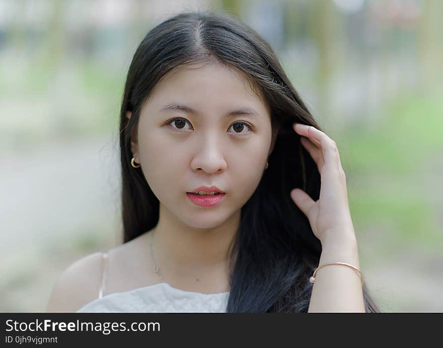 Woman Wearing Gold Bracelet