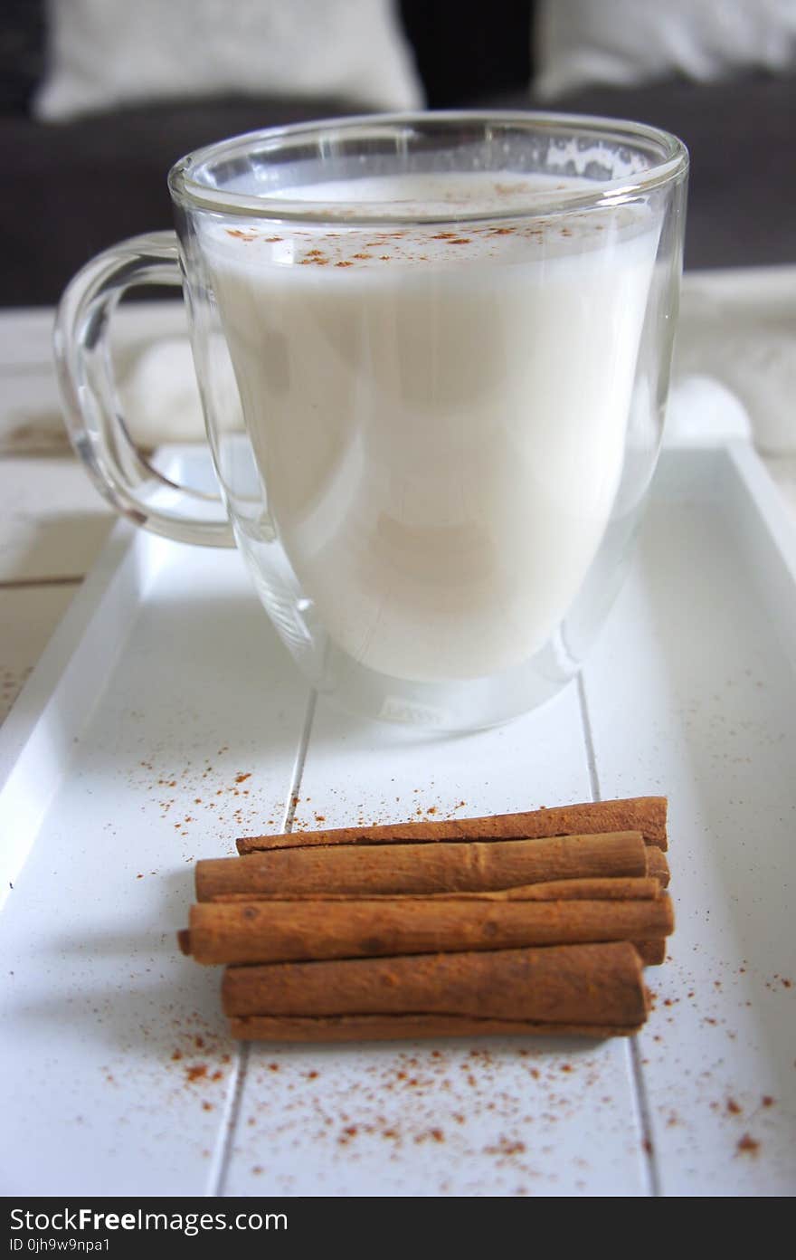 Cinnamon Sticks beside the Glass of Milk