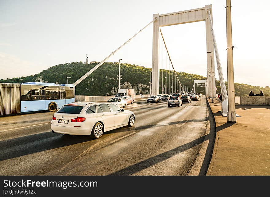 White 5-door Hatchback in Bridge