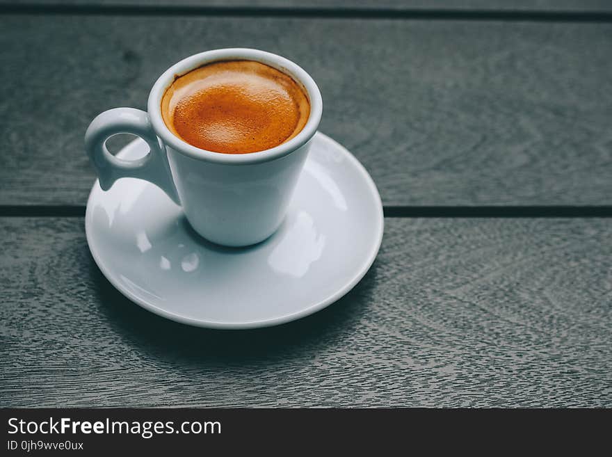 White Ceramic Mug and Saucer