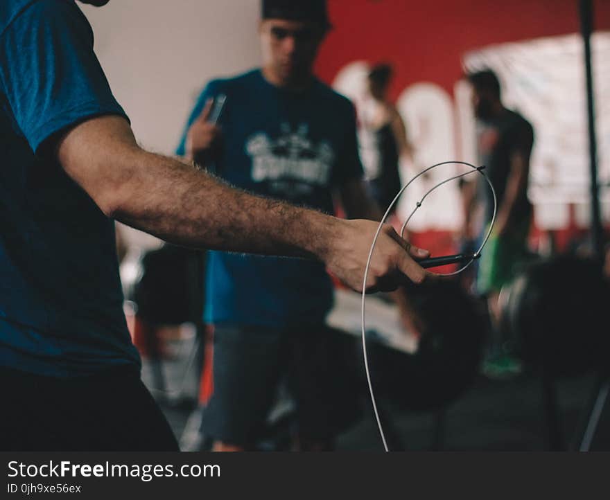 Person Holding Wire