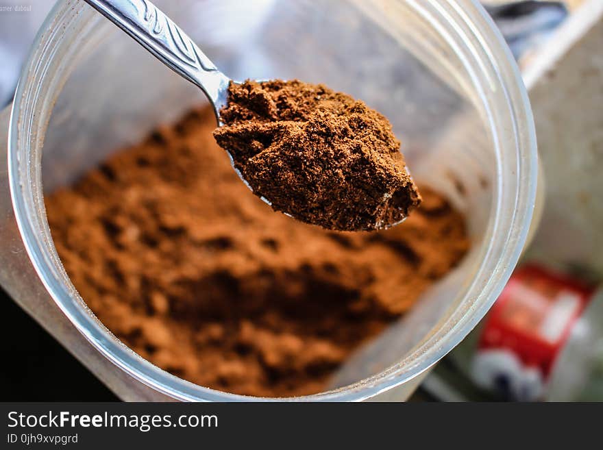 Shallow Focus Photography of Brown Powder on Stainless Steel Tea Spoon