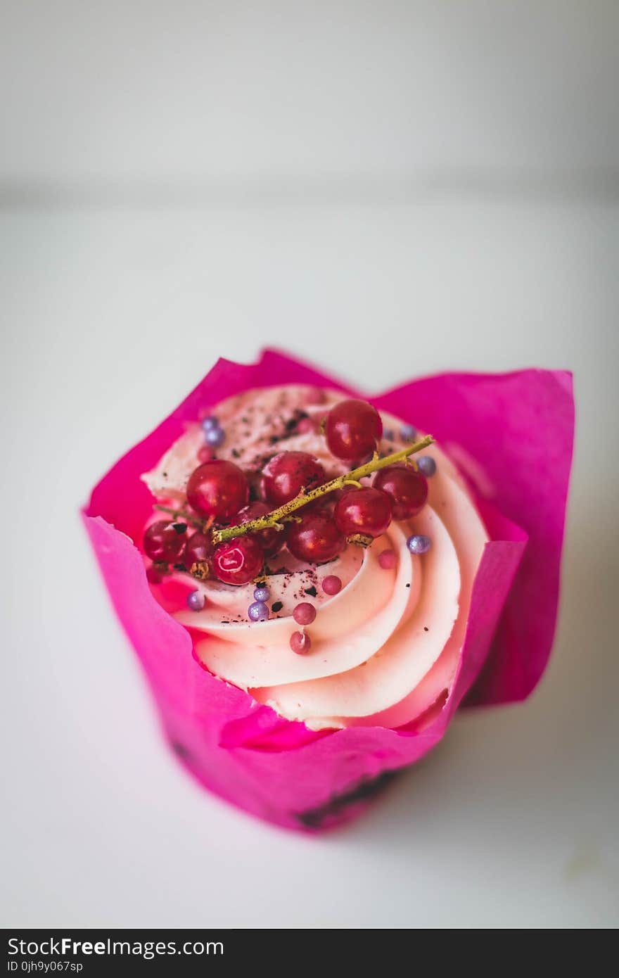 Cupcake With Red Berries on Top