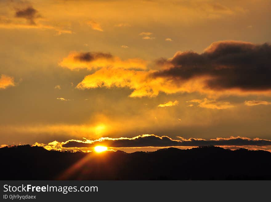 Silhouette of Mountains during Sunset