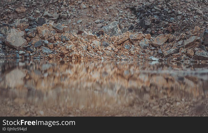 Body of Water And Rocks