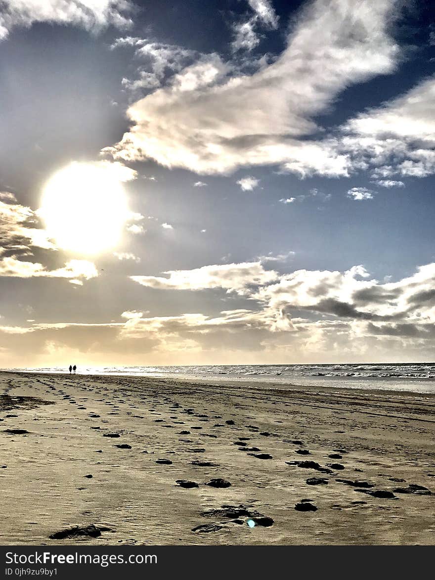 Landscape Photography of Body of Water and Seashore