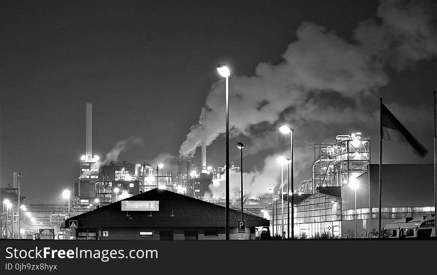 Grayscale Photography of a Factory