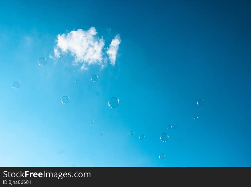 Bubbles Under White Clouds