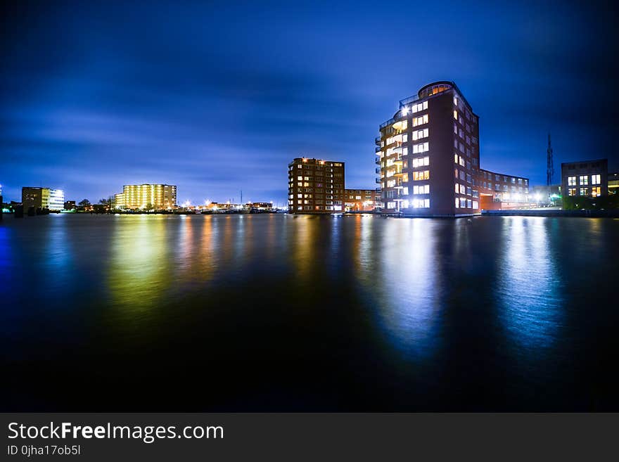 Buildings Beside Body Of Water