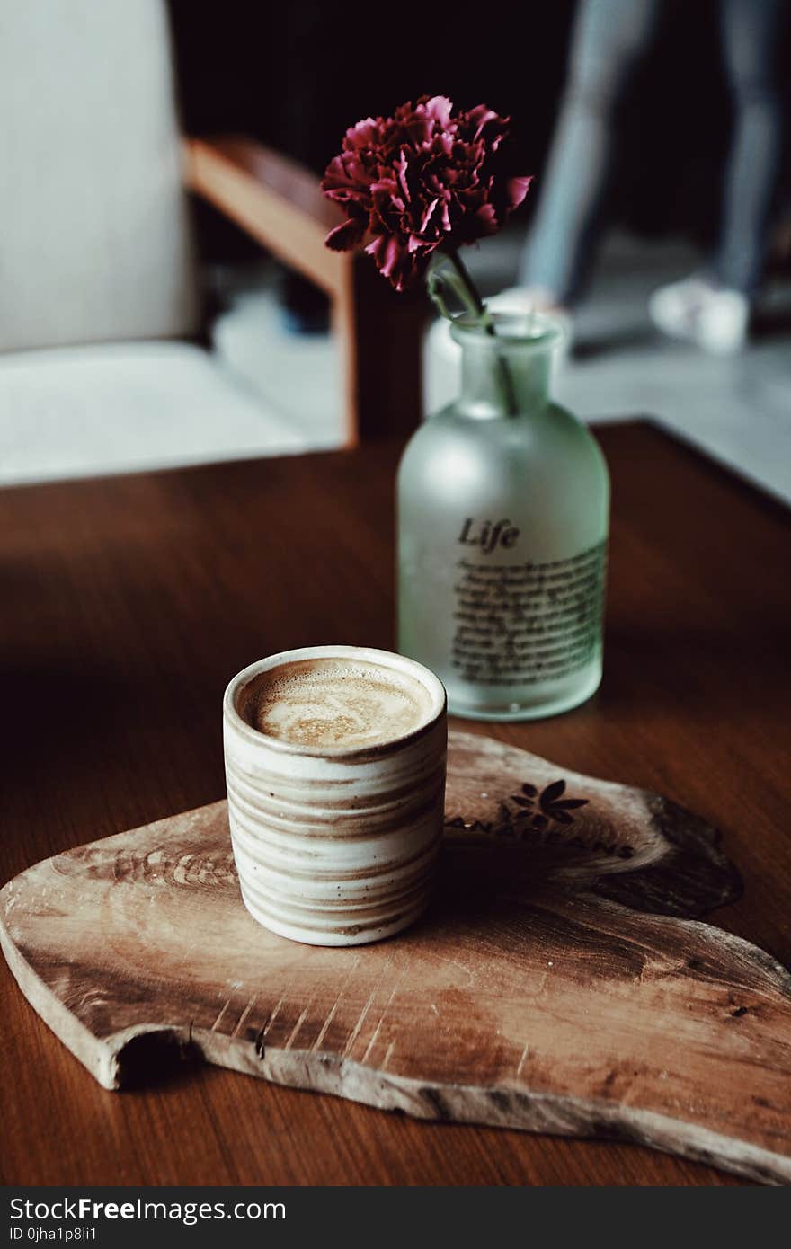 Brown Cup on Brown Wood Slab