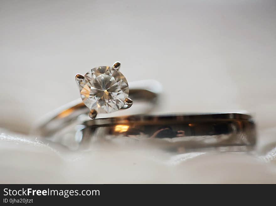 Close Up Photo of Diamond Stud Silver-colored Eternity Ring