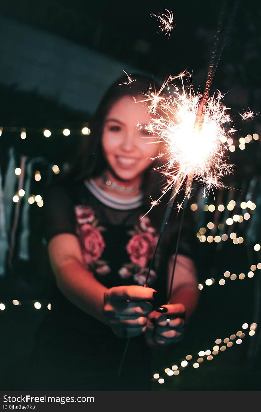 Woman Holding Firecrackers