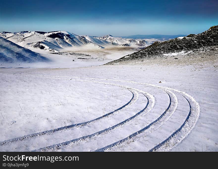 Landmark Photography of Hills Covered With Snow