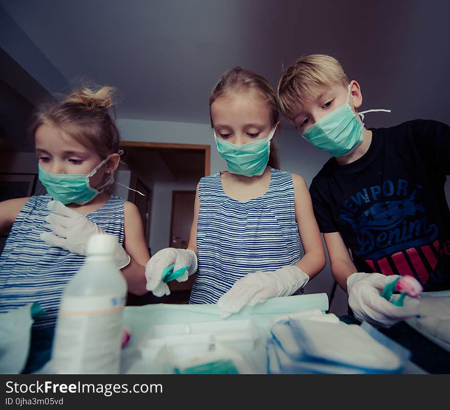 Three Children Wearing Face Masks