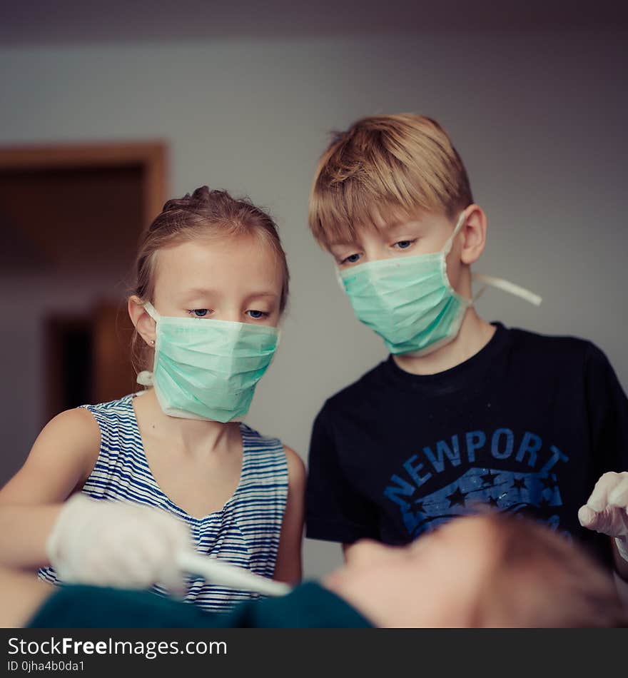 Two Children Wearing Surgical Masks