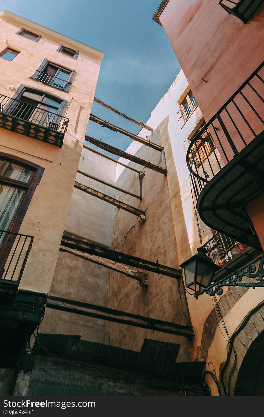 Worm&#x27;s Eye View of Brown Concrete Building