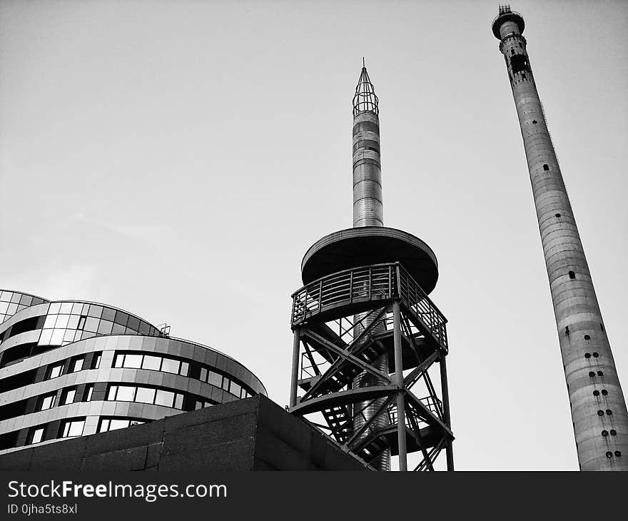 Grayscale Photograph of High-rise Tower