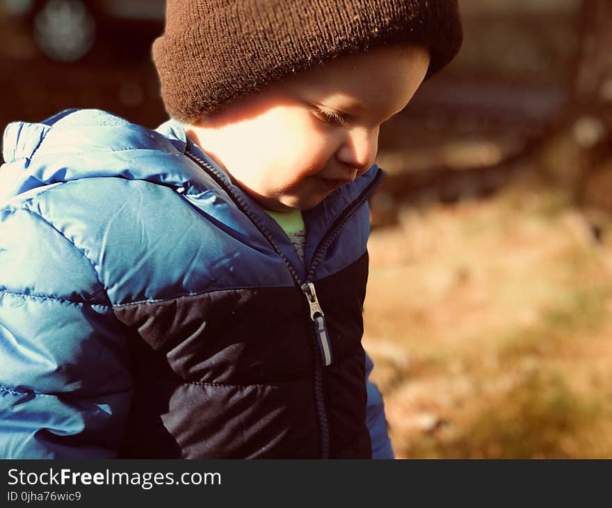 Close-up Photography of a Boy