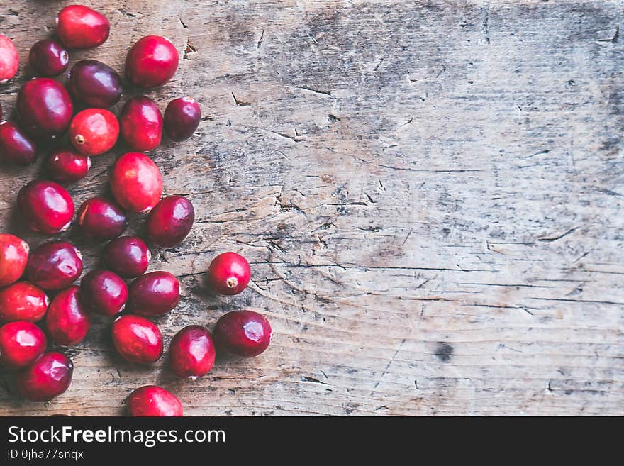 Coffee Beans on top of the Wooden Surface