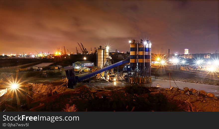 Photo of High Raise Buildings during Night Time