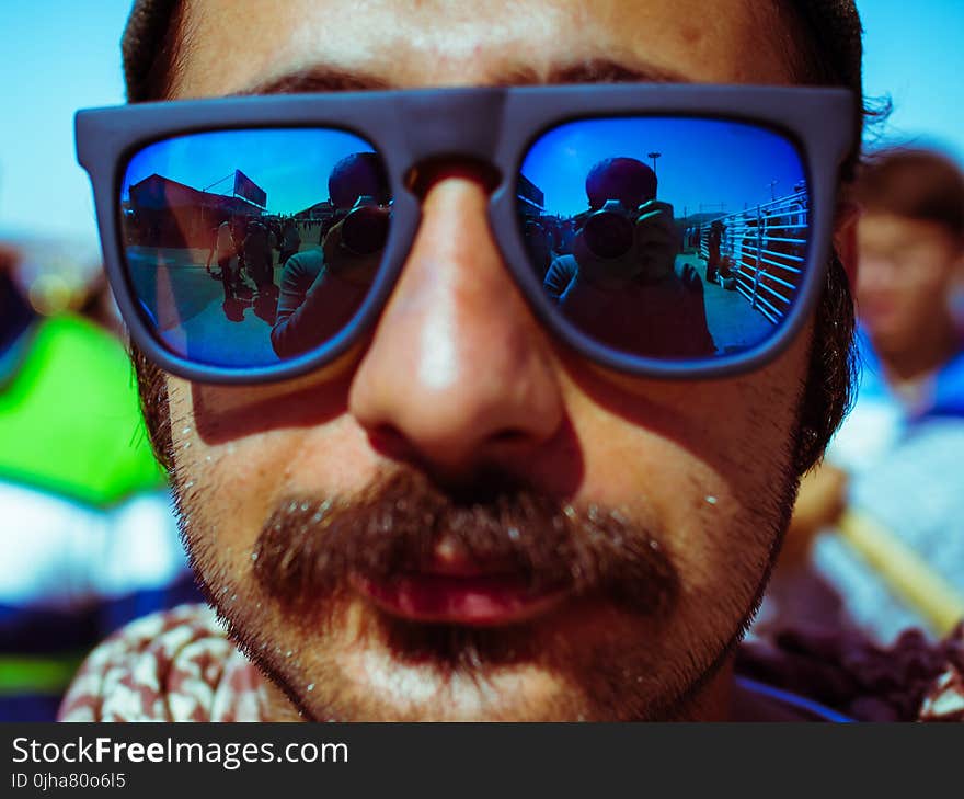 Man Wearing Black Framed Sunglasses