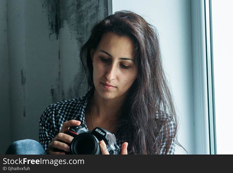 Woman Holding Nikon Dslr Camera