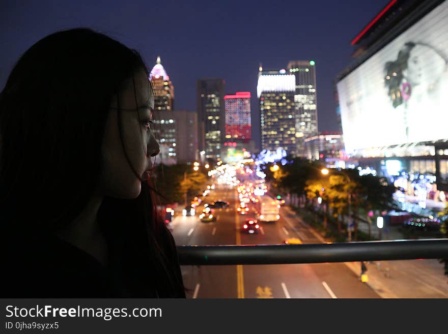 Woman Looking Down The Street