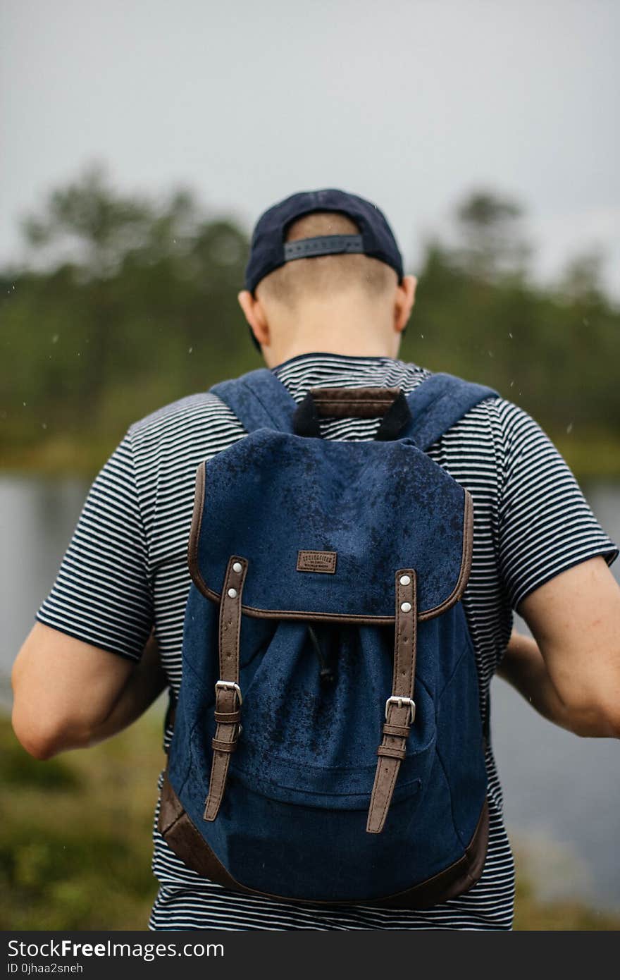 Man Wearing Black Backpack